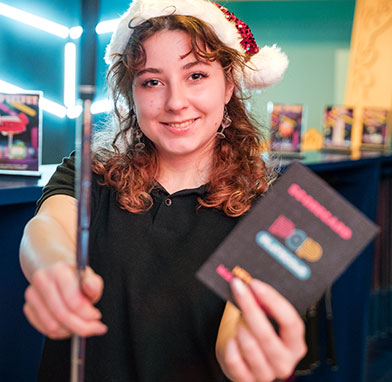 Woman playing mini-golf